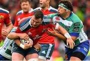 25 April 2015; Dave Kilcoyne, Munster, is tackled by Rupert Harden, left, and Matteo Zanusso, Benetton Treviso. Guinness PRO12, Round 20, Munster v Benetton Treviso. Irish Independent Park, Cork. Picture credit: Ramsey Cardy / SPORTSFILE