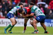 25 April 2015; Andrew Smith, Munster, is tackled by Jayden Hayward, left, and Matteo Zanusso, Benetton Treviso. Guinness PRO12, Round 20, Munster v Benetton Treviso. Irish Independent Park, Cork. Picture credit: Ramsey Cardy / SPORTSFILE