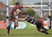 25 April 2015; Matt D'Arcy, Clontarf, is tackled by Harrison Brewer, Terenure. Ulster Bank League, Division 1A, Semi-Final, Terenure v Clontarf. Lakelands Park, Terenure, Dublin. Picture credit: Cody Glenn / SPORTSFILE