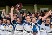 25 April 2015; Edenderry captain Oonagh Mulligan lifts the Paul Flood Plate as her team-mates celebrate. Bank  of Ireland Paul Flood Plate Final, Kilkenny v Edenderry. Greystones RFC, Dr. Hickey Park, Greystones, Co. Wicklow.  Picture credit: Matt Browne / SPORTSFILE