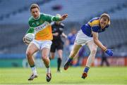 25 April 2015; William Mulhall, Offaly, in action against Barry O'Farrell, Longford. Allianz Football League, Division 4, Final, Longford v Offaly. Croke Park, Dublin. Photo by Sportsfile