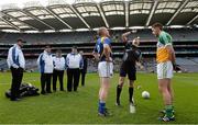 25 April 2015; Referee Niall Cullen tosses the coin as Longford captain Dermot Brady and Offaly captain Paul McConway look on. Allianz Football League, Division 4, Final, Longford v Offaly. Croke Park, Dublin. Photo by Sportsfile