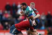 25 April 2015; Jose Francisco Novak, Benetton Treviso, is tackled by Donnacha Ryan, left, and John Ryan, Munster. Guinness PRO12, Round 20, Munster v Benetton Treviso. Irish Independent Park, Cork. Picture credit: Ramsey Cardy / SPORTSFILE
