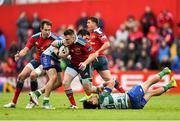 25 April 2015; Rory Scannell, Munster, is tackled by Enrico Bacchin, left, and Sam Christie, Benetton Treviso. Guinness PRO12, Round 20, Munster v Benetton Treviso. Irish Independent Park, Cork. Picture credit: Ramsey Cardy / SPORTSFILE