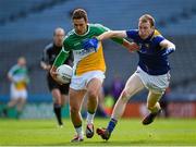 25 April 2015; William Mulhall, Offaly, in action against Barry O'Farrell, Longford. Allianz Football League, Division 4, Final, Longford v Offaly. Croke Park, Dublin. Photo by Sportsfile