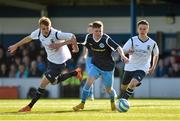 25 April 2015; James Doona, Dublin & District Schoolboys League, in action against Adam Murphy, left, and Jackson Ryan, right, North Dublin Schoolboy/girl League. FAI Umbro Youth Inter League Cup Final, Dublin & District Schoolboys League v North Dublin Schoolboy/girl League. Home Farm FC, Whitehall, Dublin. Picture credit: Pat Murphy / SPORTSFILE