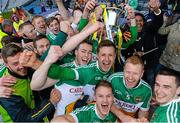 25 April 2015; Offaly players celebrate with the cup after the game. Allianz Football League, Division 4, Final, Longford v Offaly. Croke Park, Dublin. Photo by Sportsfile