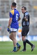 25 April 2015; Referee Niall Cullen speaks with Diarmuid Masterson, Longford, after issuing him with a red card. Allianz Football League, Division 4, Final, Longford v Offaly. Croke Park, Dublin. Picture credit: Cody Glenn / SPORTSFILE