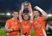 25 April 2015; Armagh team-mates, from left, Eoin McArdle, Michael Murray, and Sean Connell with the trophy after the game. Allianz Football League, Division 3, Final, Armagh v Fermanagh. Croke Park, Dublin. Picture credit: Cody Glenn / SPORTSFILE