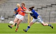 26 April 2015; Fionnuala McKenna, Armagh, in action against Emma McDermott, Cavan. TESCO HomeGrown Ladies National Football League, Division 2, Semi-Final, Armagh v Cavan. St Tiarnach's Park, Clones, Co. Monaghan. Picture credit: Pat Murphy / SPORTSFILE