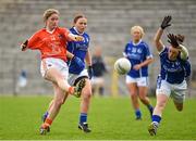 26 April 2015; Fionnuala McKenna, Armagh, in action against Laura Fitzpatrick, left, and Emma McDermott, Cavan. TESCO HomeGrown Ladies National Football League, Division 2, Semi-Final, Armagh v Cavan. St Tiarnach's Park, Clones, Co. Monaghan. Picture credit: Pat Murphy / SPORTSFILE