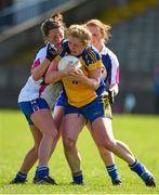 26 April 2015; Caitriona Regan, Roscommon, in action against Michelle McGrath, left, and Nicola Fennell, Waterford. TESCO HomeGrown Ladies National Football League, Division 3, Semi-Finals, Waterford v Roscommon. McDonagh Park, Nenagh, Co. Tipperary Picture credit: Diarmuid Greene / SPORTSFILE