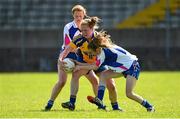 26 April 2015; Caitriona Regan, Roscommon, in action against Nicola Fennell, left, and Aileen Wall, Waterford. TESCO HomeGrown Ladies National Football League, Division 3, Semi-Finals, Waterford v Roscommon. McDonagh Park, Nenagh, Co. Tipperary Picture credit: Diarmuid Greene / SPORTSFILE