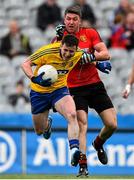 26 April 2015; Ciaráin Murtagh, Roscommon, is tackled by Peter Turley, Down. Allianz Football League, Division 2, Final, Down v Roscommon. Croke Park, Dublin. Picture credit: Ramsey Cardy / SPORTSFILE