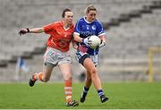 26 April 2015; Donna English, Cavan, in action against Sarah Marley, Armagh. TESCO HomeGrown Ladies National Football League, Division 2, Semi-Final, Armagh v Cavan. St Tiarnach's Park, Clones, Co. Monaghan. Picture credit: Pat Murphy / SPORTSFILE