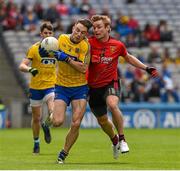 26 April 2015; Neil Collins, Roscommon, in action against Caolan Mooney, Down. Allianz Football League, Division 2, Final, Down v Roscommon. Croke Park, Dublin. Picture credit: Ray McManus / SPORTSFILE
