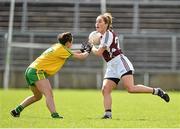 26 April 2015; Fiona Leavy, Westmeath, in action against Rose Boyle, Donegal. TESCO HomeGrown Ladies National Football League, Division 2, Semi-Final, Donegal v Westmeath. St Tiarnach's Park, Clones, Co. Monaghan. Picture credit: Pat Murphy / SPORTSFILE
