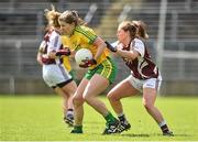 26 April 2015; Ciara Hegarty, Donegal, in action against Sarah Dolan, Westmeath. TESCO HomeGrown Ladies National Football League, Division 2, Semi-Final, Donegal v Westmeath. St Tiarnach's Park, Clones, Co. Monaghan. Picture credit: Pat Murphy / SPORTSFILE