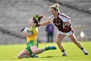 26 April 2015; Geraldine McLaughlin, Donegal, in action against Aileen Martin, Westmeath. TESCO HomeGrown Ladies National Football League, Division 2, Semi-Final, Donegal v Westmeath. St Tiarnach's Park, Clones, Co. Monaghan. Picture credit: Pat Murphy / SPORTSFILE