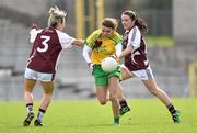 26 April 2015; Niamh Hegarty, Donegal, in action against Aileen Martin, left, and Emma Morris, Westmeath. TESCO HomeGrown Ladies National Football League, Division 2, Semi-Final, Donegal v Westmeath. St Tiarnach's Park, Clones, Co. Monaghan. Picture credit: Pat Murphy / SPORTSFILE