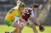 26 April 2015; Triona Durkan, Westmeath, in action against Yvonne McMonagle, Donegal. TESCO HomeGrown Ladies National Football League, Division 2, Semi-Final, Donegal v Westmeath. St Tiarnach's Park, Clones, Co. Monaghan. Picture credit: Pat Murphy / SPORTSFILE