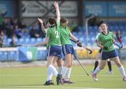 26 April 2015; Cork Church of Ireland's Claire Hickey, left, with teammates Emma Barber, Jenifer Barry and Sinead James celebrate after the final whistle. Women’s Irish Trophy final, Cork Chirch of Ireland v Galway, Belfield, Dublin. Picture credit: Ray Lohan / SPORTSFILE