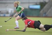 26 April 2015; Amy Roberts, Cork Church of Ireland, skips past Emma Glanville, Galway. Women’s Irish Trophy final, Cork Church of Ireland v Galway, Belfield, Dublin. Picture credit: Ray Lohan / SPORTSFILE