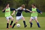 23 April 2015; Jack Boyle, Scoil Mhuire, Glenties, Co. Donegal, in action against Lee Cunningham and Liam Martin, St. Brigid’s NS, Aughnafarcon, Co. Monaghan. SPAR FAI Primary School 5s Ulster Final, St. Brigid’s NS, Aughnafarcon, Co. Monaghan v Scoil Mhuire, Glenties, Co. Donegal. Sherlock Park, Cootehill Harps FC, Cootehill, Co. Cavan. Picture credit: Matt Browne / SPORTSFILE