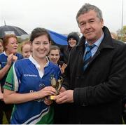 25 April 2015; Maeve Bolger, Gorey is presented with her player of the match trophy by Frank Doherty from Leinster Rugby. Bank of Ireland Paul Cusack Cup Final, Balbriggan v Gorey. Greystones RFC, Dr. Hickey Park, Greystones, Co. Wicklow. Picture credit: Matt Browne / SPORTSFILE