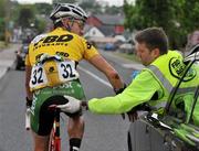 21 May 2008; Race leader Mark Cassidy, An Post sponsored Sean Kelly team, is attended to by Dr. Conor McGrane after crashing on the approach to Patrickswell, Co. Limerick. FBD Insurance Ras 2008 - Stage 4, Corofin - Tralee. Picture credit: Stephen McCarthy / SPORTSFILE