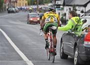 21 May 2008; Race leader Mark Cassidy, An Post sponsored Sean Kelly team, is attended to by Dr. Conor McGrane after a crash on the approach to Patrickswell, Co. Limeirck. FBD Insurance Ras 2008 - Stage 4, Corofin - Tralee. Picture credit: Stephen McCarthy / SPORTSFILE