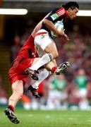 24 May 2008; Rua Tipoki, Munster, is tackled by William Servat, Toulouse. Heineken Cup Final, Munster v Toulouse, Millennium Stadium, Cardiff, Wales. Picture credit: Peter Morrison / SPORTSFILE