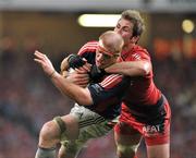24 May 2008; Paul O'Connell, Munster, is tackled by Shaun Sowerby, Toulouse. Heineken Cup Final, Munster v Toulouse, Millennium Stadium, Cardiff, Wales. Picture credit: Brendan Moran / SPORTSFILE