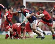 24 May 2008; Rua Tipoki, Munster, is tackled by Jean Baptiste Elissalde, Toulouse. Heineken Cup Final, Munster v Toulouse, Millennium Stadium, Cardiff, Wales. Picture credit: Richard Lane / SPORTSFILE