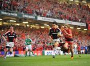 24 May 2008; Doug Howlett, Munster, gets clear of Cedric Heymans, Toulouse, to score a try which was subsequently disallowed by referee Nigel Owens. Heineken Cup Final, Munster v Toulouse, Millennium Stadium, Cardiff, Wales. Picture credit: Brendan Moran / SPORTSFILE