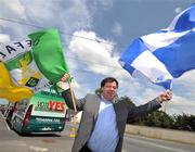25 May 2008; An Taoiseach Brian Cowen T.D, holding Offaly and Laois flags, outside the ground before the game. GAA Hurling Leinster Senior Championship Quarter-Final, Offaly v Laois, O'Moore Park, Portlaoise, Co. Laois. Picture credit: David Maher / SPORTSFILE