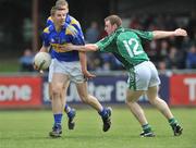 25 May 2008; Brian Jones, Tipperary, in action against Seanie Buckley, Limerick. GAA Football Munster Senior Championship Quarter-Final, Limerick v Tipperary, Fitzgerald Park, Fermoy, Co. Cork. Picture credit: Brian Lawless / SPORTSFILE