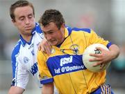 25 May 2008; Clare's David Connole in action against Waterford's Liam Lawlor. GAA Football Munster Senior Championship Quarter-Final, Clare v Waterford, Cusack Park, Ennis, Co. Clare. Picture credit: Ray Ryan / SPORTSFILE