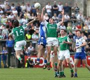 25 May 2008; Ciaran McElroy and Martin McGrath, Fermanagh, in action against Eoin Lennon, Monaghan. GAA Football Ulster Senior Championship Quarter-Final, Fermanagh v Monaghan, Brewster Park, Enniskillen, Co. Fermanagh. Picture credit: Oliver McVeigh / SPORTSFILE
