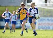 26 April 2015; Mairead Wall, Waterford, in action against Joanne Cregg, Roscommon. TESCO HomeGrown Ladies National Football League, Division 3, Semi-Finals, Waterford v Roscommon. McDonagh Park, Nenagh, Co. Tipperary Picture credit: Diarmuid Greene / SPORTSFILE