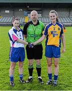 26 April 2015; Waterford captain Linda Wall and Roscommon captain Jenny Higgins exchange a handshake in the company of referee Jonathan Murphy. TESCO HomeGrown Ladies National Football League, Division 3, Semi-Finals, Waterford v Roscommon. McDonagh Park, Nenagh, Co. Tipperary Picture credit: Diarmuid Greene / SPORTSFILE