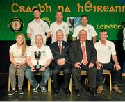 25 April 2015; Mullingar Shamrocks, Co Westmeath, winners of the Léiriú Stairúil. Pictured are, back row from left, Robert Ryan, Paul McDermott and Joe Early. Front row, from left, Rebecca Doolin, Paul Doolin and Martin Coyne, with Uachtarán Chumann Lúthchleas Gael Aogán Ó Feargháil, left, and Liam Ó Laochdha, Cathaoirleach, Coiste Náisiúnta Scór. All-Ireland Scór Sinsir Championship Finals 2015. Citywest Hotel, Saggart, Co. Dublin. Picture credit: Piaras O Midheach / SPORTSFILE