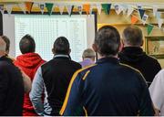 25 April 2015; Competitors watch as the final scores in the TrÃ¡th na gCeisteanna Boird are tallied up. All-Ireland ScÃ³r Sinsir Championship Finals 2015. Citywest Hotel, Saggart, Co. Dublin. Picture credit: Piaras O Midheach / SPORTSFILE
