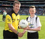 26 April 2015; Match referee Pádraig Hughes with Adam Lambe, St. Lorcan's National School, Palmerstown, before the game. Allianz Football League, Division 1, Final, Dublin v Cork. Croke Park, Dublin. Picture credit: Ray McManus / SPORTSFILE