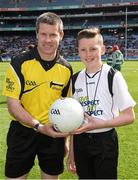 26 April 2015; Match referee Pádraig Hughes with Adam Lambe, St. Lorcan's National School, Palmerstown, before the game. Allianz Football League, Division 1, Final, Dublin v Cork. Croke Park, Dublin. Picture credit: Ray McManus / SPORTSFILE