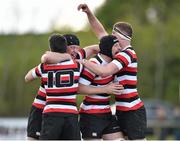 26 April 2015; Enniscorthy's match winning goal kicker Ivan Poole, 10, is congratulated by player manager Declan O'Brien, left, Sean Wall and Thomas Stamp after the final whistle. Bank of Ireland 90th Provincial Towns Cup, Enniscorthy v Kilkenny. Cill Dara RFC, Dunmurray West, Kildare. Picture credit: Matt Browne / SPORTSFILE