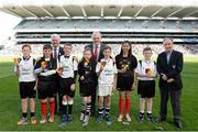 26 April 2015; UachtarÃ¡n Chumann LÃºthchleas AogÃ¡n Ó Fearghail, back row, from left, Allianz Ireland CEO Brendan Murphy and Edward O'Riordan, Chairman of Cumann na mBunscol joined Outstanding Youth Players, from left, Conor Doyle, age 12, of Sacred Heart National School Huntstown, Ronan Houlihan, age 12, of St. Pius X Terenure, Fionn Halligan, age 12, of St. Pius X Terenure, Claire Canning, age 11, of St. John of God's, Cormac McDonnell, age 12, Holy Spirit Ballyroan, Jasmine Kamtoh, age 12, Holy Trinity Donoghade and Oran Burke, age 12, of St. Joseph's National School at the Presentation to Cumann na mBunscol Outstanding Players at the Allianz Football League Division 1 Final. Croke Park, Dublin. Picture credit: Cody Glenn / SPORTSFILE