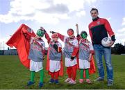 28 April 2015; Four-time All-Star Donegal Gaelic footballer Karl Lacey, pictured with Alice Brannigan, aged eight, and Hannah Brannigan, right, aged seven, and twins Conor and Tadhg Scanlon, left, both aged seven at the launch of Kellogg’s renewed sponsorship deal with GAA Cúl Camps. Details were also revealed about ‘Kellogg’s Powering Play’, a new fun game based nutritional workshop that will be piloted by Kellogg’s and the GAA this summer at selected Cúl Camps to help promote the benefits of physical activity and eating well. Kellogg’s GAA Cúl Camps take place throughout the summer in over 1,000 clubs around the country. Parents can log on to www.gaa.ie/kelloggsculcamps to book their child’s place. Na Fianna GAA Club, Glasnevin, Co. Dublin. Photo by Sportsfile