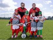 28 April 2015; Kilkenny hurling legend Henry Shefflin and four-time All-Star Donegal Gaelic footballer Karl Lacey, left, pictured with Alice Brannigan, left, aged eight, and Hannah Brannigan, aged seven, and twins Conor, left, and Tadhg Scanlon, both aged seven, at the launch of Kellogg’s renewed sponsorship deal with GAA Cúl Camps. Details were also revealed about ‘Kellogg’s Powering Play’, a new fun game based nutritional workshop that will be piloted by Kellogg’s and the GAA this summer at selected Cúl Camps to help promote the benefits of physical activity and eating well. Kellogg’s GAA Cúl Camps take place throughout the summer in over 1,000 clubs around the country. Parents can log on to www.gaa.ie/kelloggsculcamps to book their child’s place. Na Fianna GAA Club, Glasnevin, Co. Dublin. Photo by Sportsfile