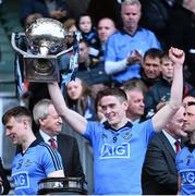 26 April 2015; Dublin's Brian Fenton lifts the cup following his side's victory. Allianz Football League, Division 1, Final, Dublin v Cork. Croke Park, Dublin. Picture credit: Ramsey Cardy / SPORTSFILE